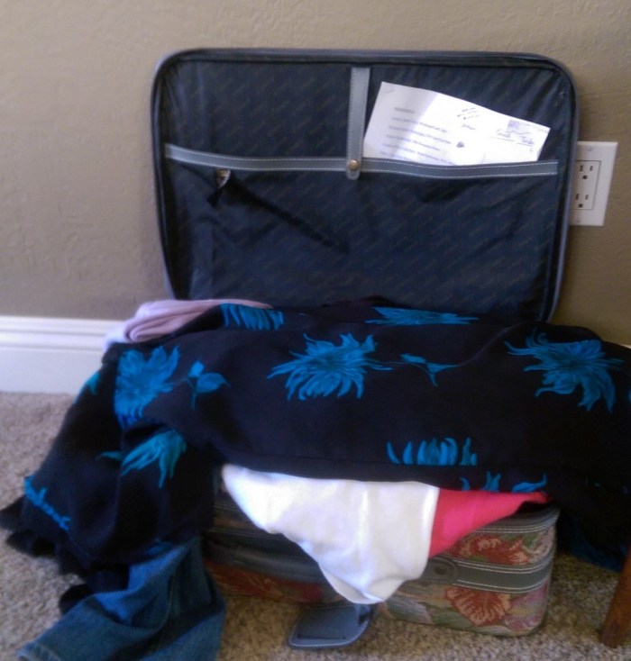 Unpacked open suitcase